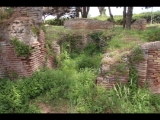 07858 ostia - regio iv - insula i - campo della magna mater - porticus an der suedseite - ostende - fossa sanguinis (iv,i,6) - 06-2024.jpg